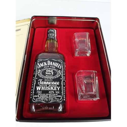 516 - Bottle of Jack Daniels in a tin with glasses