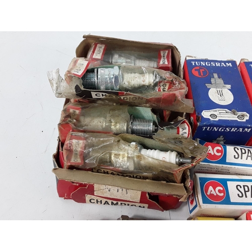 565 - Box of vintage spark plugs and bulbs