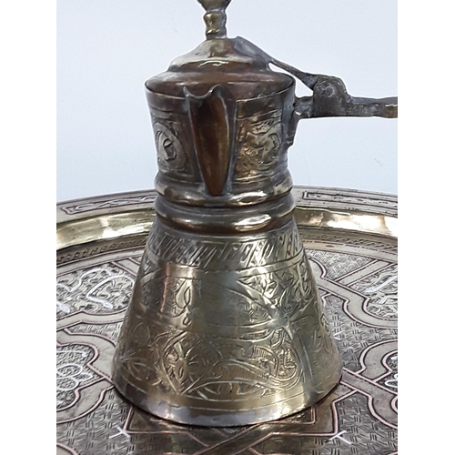 566 - Small brass topped tray table and Eastern drinks set with a sea horse pin dish