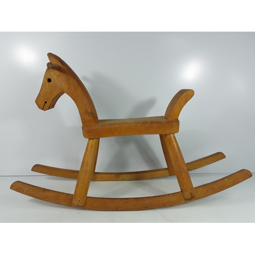 576 - Wooden rocking horse, 50cms in height and 75cms in length