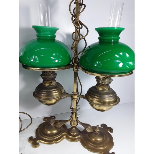 577 - Pair of brass electric oil style double lamps, approx 62cms in height