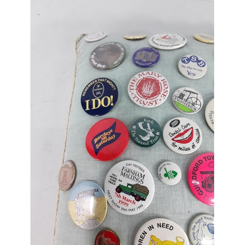 590 - Cushion of badges