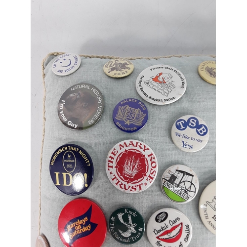 590 - Cushion of badges