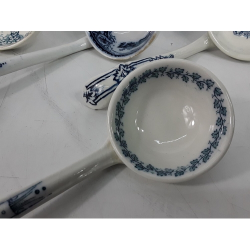 609 - Box of blue and white sauce ladles