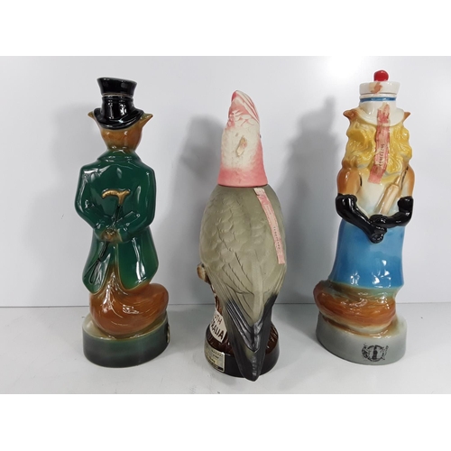 637 - Collectable parrot decanter and 2 Jim Beam tall figural decanters