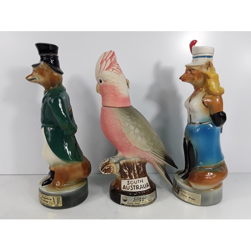 637 - Collectable parrot decanter and 2 Jim Beam tall figural decanters