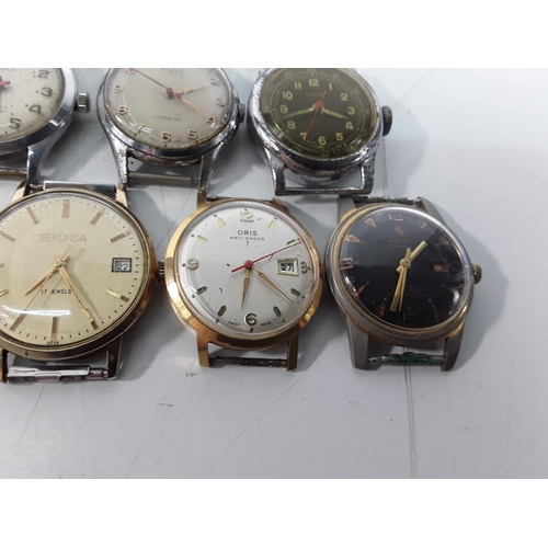 669 - Selection of vintage manual wind watches