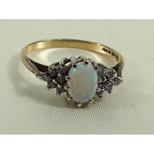 676 - 9ct gold opal and diamond ring, size O, 2g gross