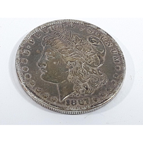 679 - 1887 silver Morgan dollar