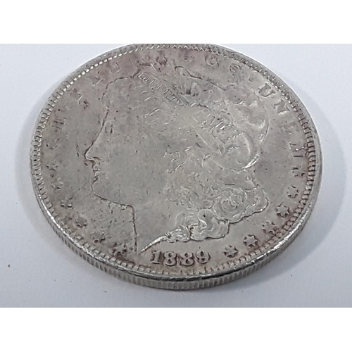 684 - 1889 silver Dollar