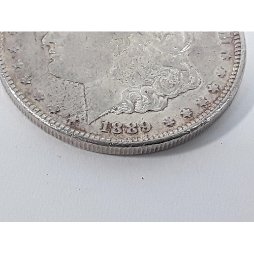 684 - 1889 silver Dollar