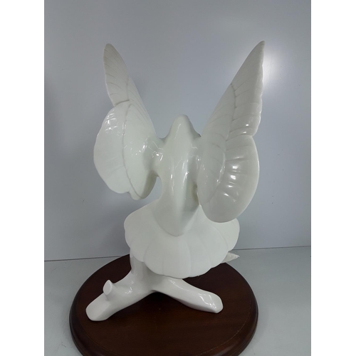 740 - Large Doulton Images of nature Doves on wooden base, 40cms in height without the plinth