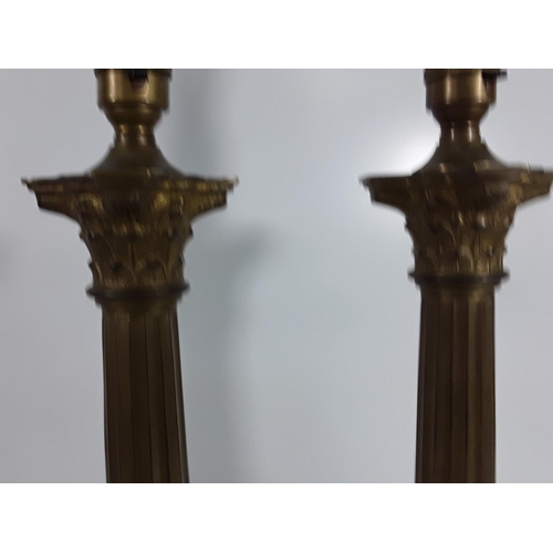 495 - Pair of heavy brass column lamps