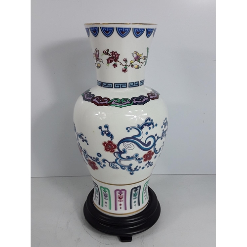 612 - Boxed oriental porcelain vase on stand