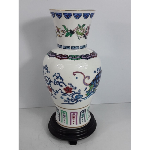 612 - Boxed oriental porcelain vase on stand