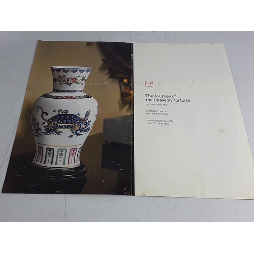 612 - Boxed oriental porcelain vase on stand