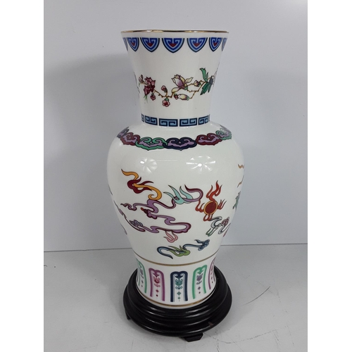 613 - Boxed oriental porcelain vase on stand