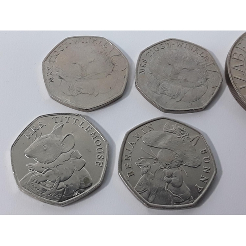 664 - Qty of 50pence pieces and a crown