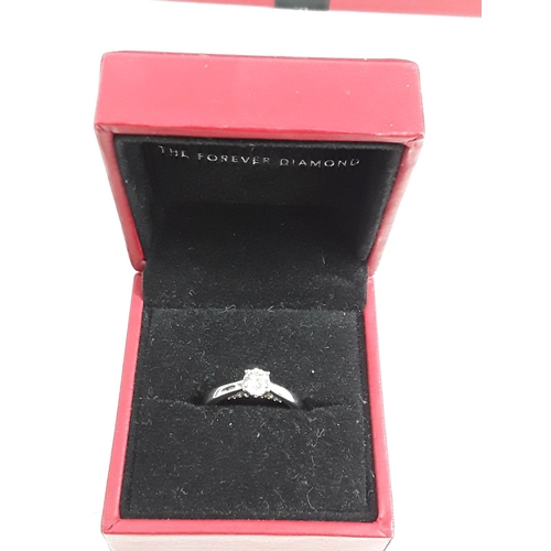 704 - 18ct white gold solitaire diamond ring with certificate