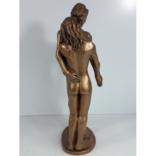 720 - Large figure of 'The Kiss', 38cms in height