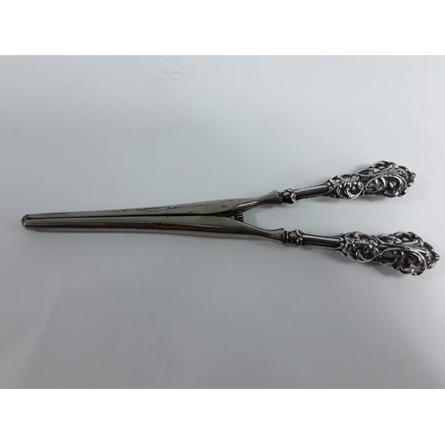 728 - Antique silver handled glove stretchers (Birmingham 1907) and antique silver mounted pin cushion (Bi... 