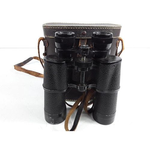 730 - Cased pair of vintage Russian binoculars