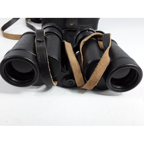 730 - Cased pair of vintage Russian binoculars