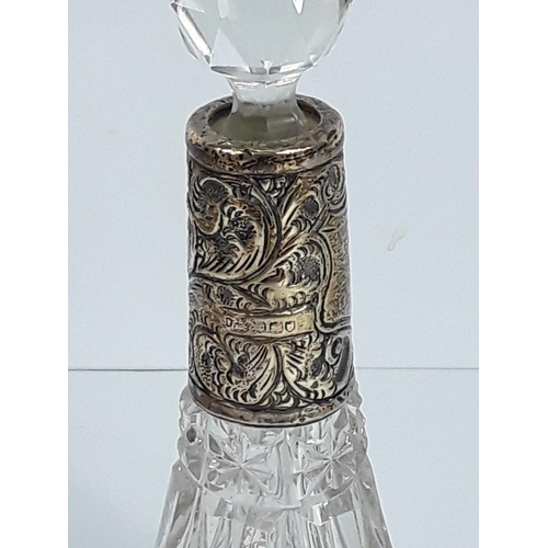 733 - Antique silver mounted cut glass scent bottle