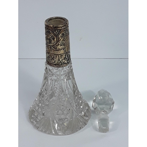 733 - Antique silver mounted cut glass scent bottle