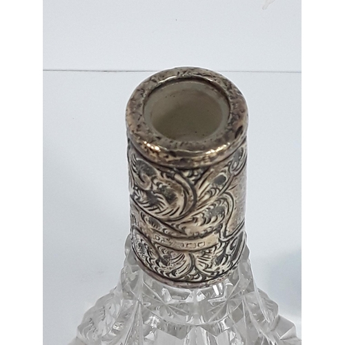 733 - Antique silver mounted cut glass scent bottle