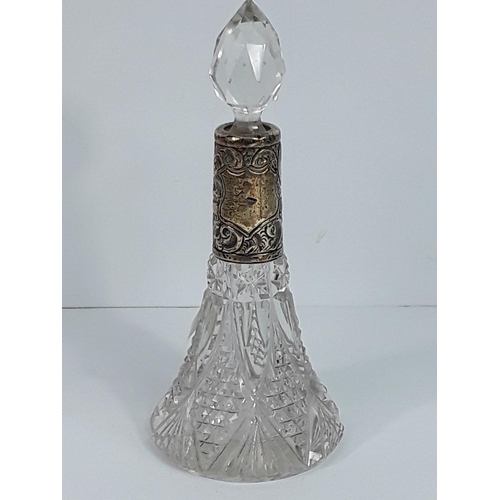 733 - Antique silver mounted cut glass scent bottle