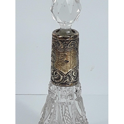 733 - Antique silver mounted cut glass scent bottle