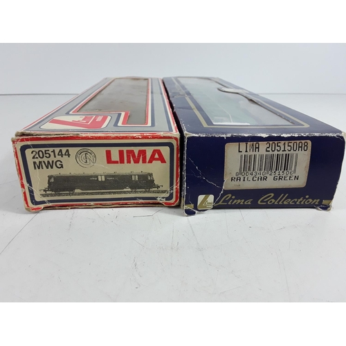 570 - 2 boxed Lima engines, unboxed engine, carriage and crane