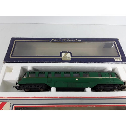 570 - 2 boxed Lima engines, unboxed engine, carriage and crane