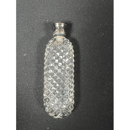 111 - Cut glass scent bottle with glass stopper and metal top