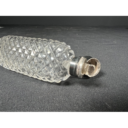 111 - Cut glass scent bottle with glass stopper and metal top