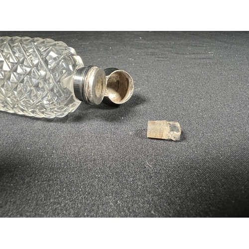 111 - Cut glass scent bottle with glass stopper and metal top