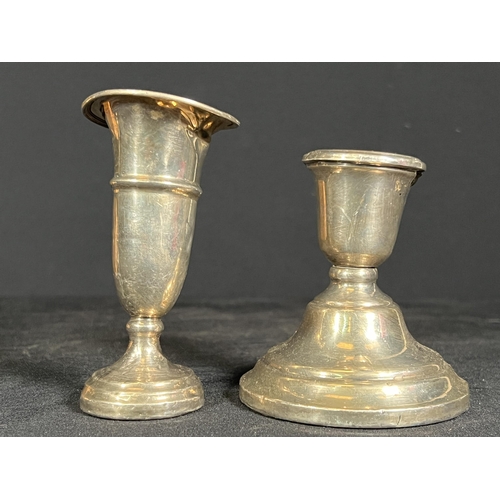 61 - Weighted silver candle stick and weighted silver vase