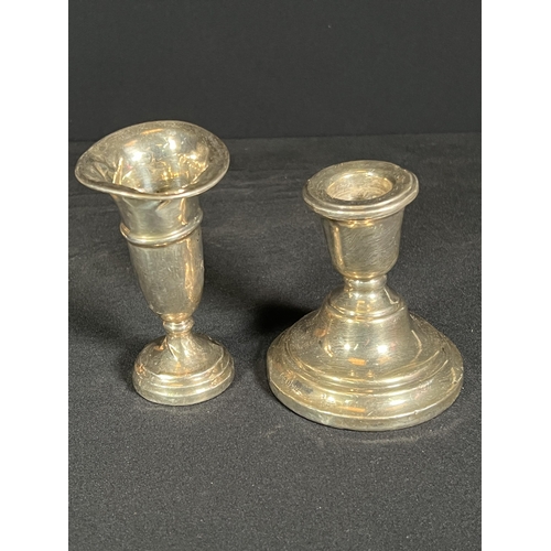 61 - Weighted silver candle stick and weighted silver vase