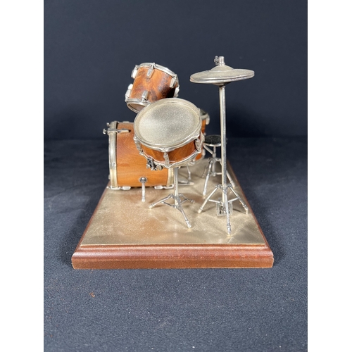 87 - Silver and wood drum kit on stand, base: 16cm x 13cm, 13cm tall