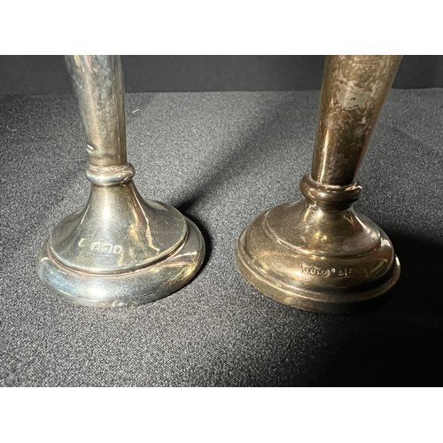 229 - 2 weighted silver vases 143.9g - one 14.5cm tall the other 13cm tall