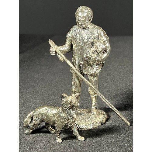 190 - Cast silver figure of farmer with crook and sheep dog 375g