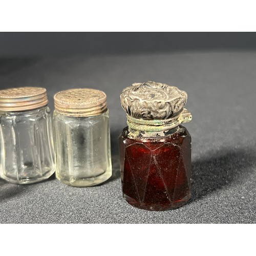 191 - Silver topped scent bottle, Red glass silver topped scent bottle and pair of silver topped cruets