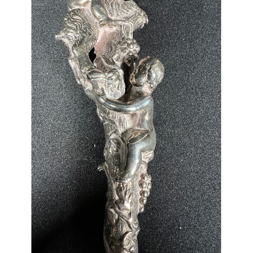 157 - White cast metal knife with cherub and goat handle