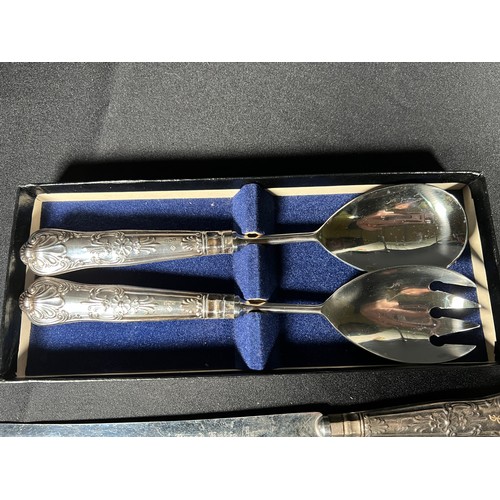 146 - Cased pair of silver handled salad servers and silver handled cake/bread knife