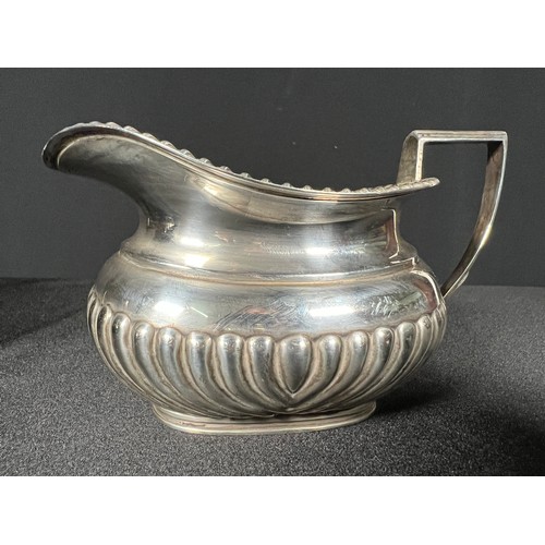 142 - Silver 3 piece tea set -Gross Milk jug and sugar pot 470g+ Teapot - 738g