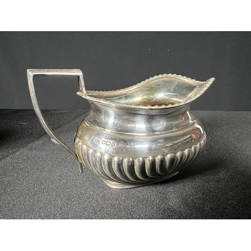 142 - Silver 3 piece tea set -Gross Milk jug and sugar pot 470g+ Teapot - 738g