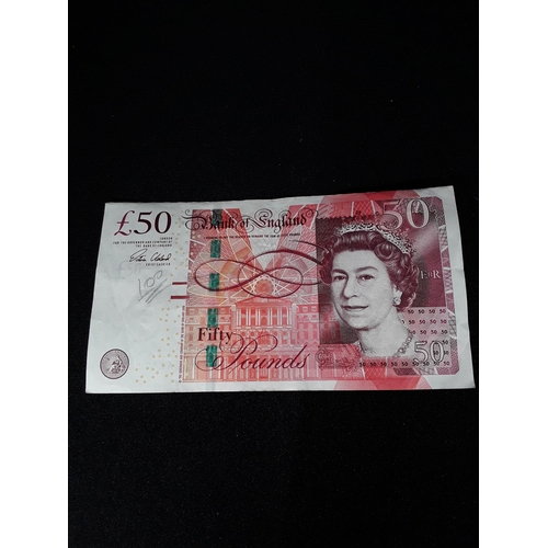 357 - Red £50 note Serial number AK47