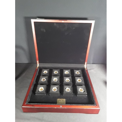 363 - Cased set of 12 The Royal house of Windsor Gold coins Each coin is 1g of 22ct gold