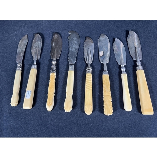 75 - 8 silver bladed butter knives with bone and celluloid handles